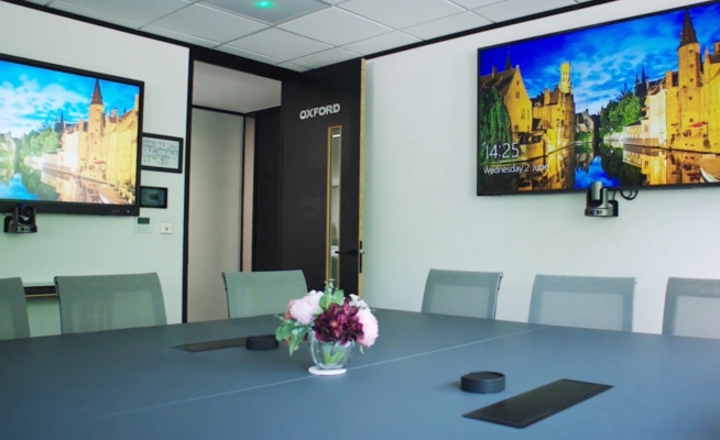 Meeting room dual screen audio visual setup for video conferences, meetings and presentations