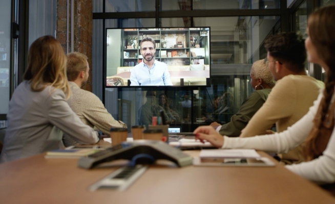 Virtual meeting taking place using the latest video conferencing software and hardware on the market